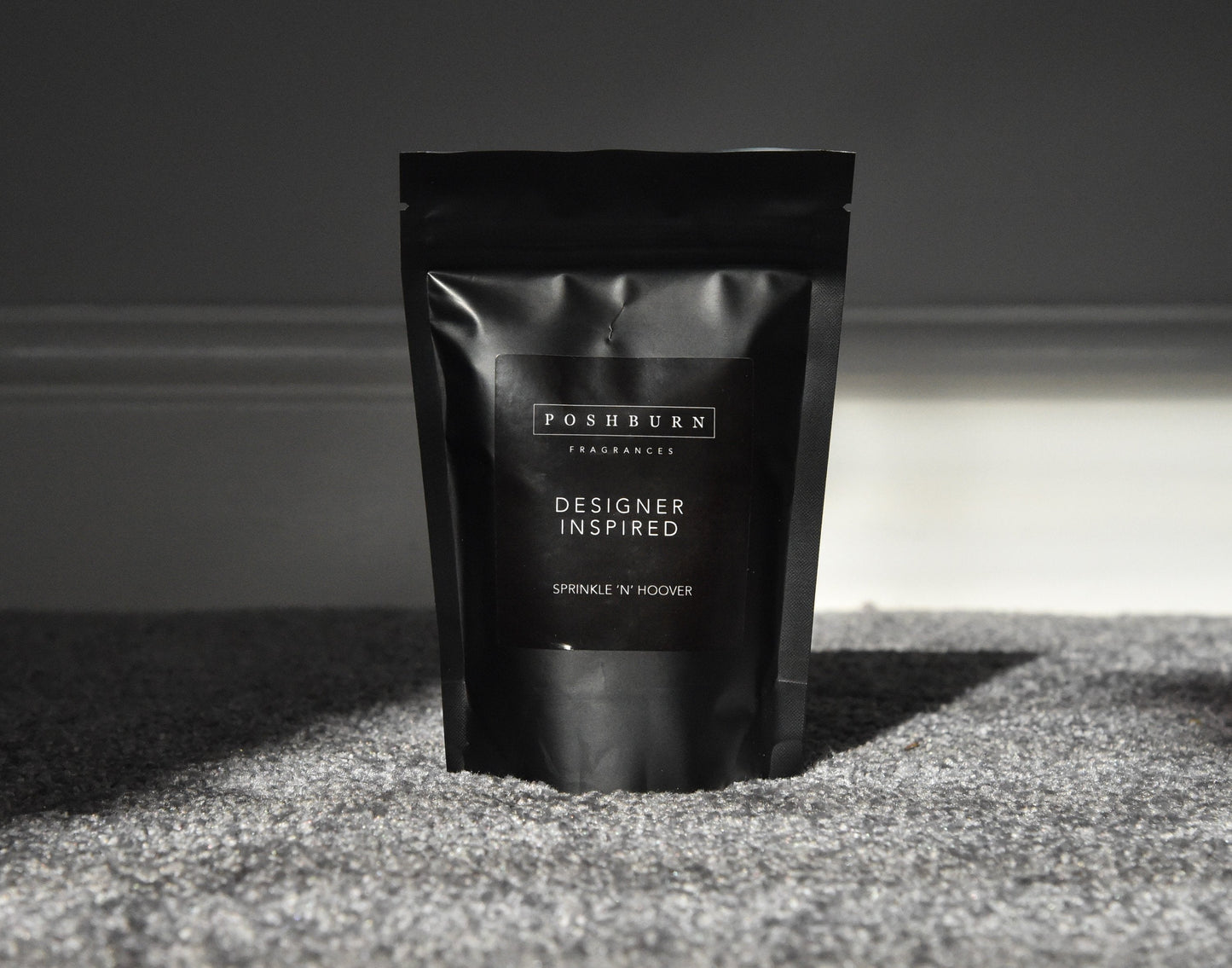 Sunlit view of Black bag of SPRINKLE n HOOVER