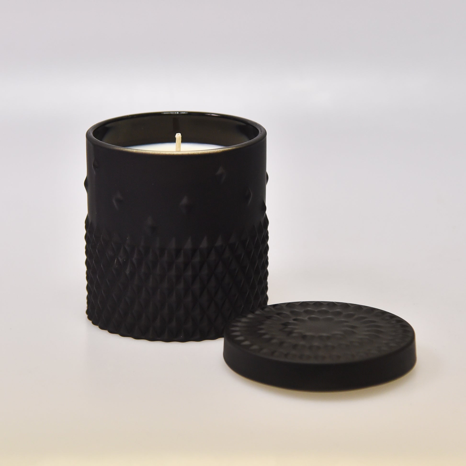Single Black Rockstud Soy Candles with lid off